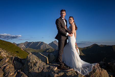 A wedding couple in the hills of Tatra mountains.